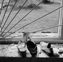 Shoes taken from the students of School No. 1 by Chechen terrorists were displayed by a window, Beslan, North Ossetia, September 2004